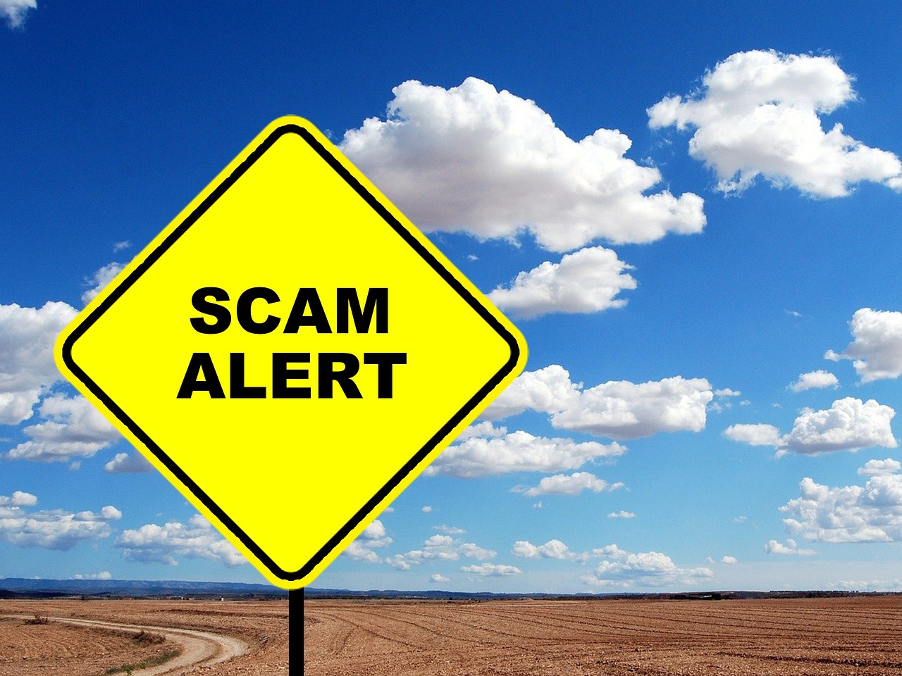 Semn de avertizare: Scam Alert (atenție la fraude)